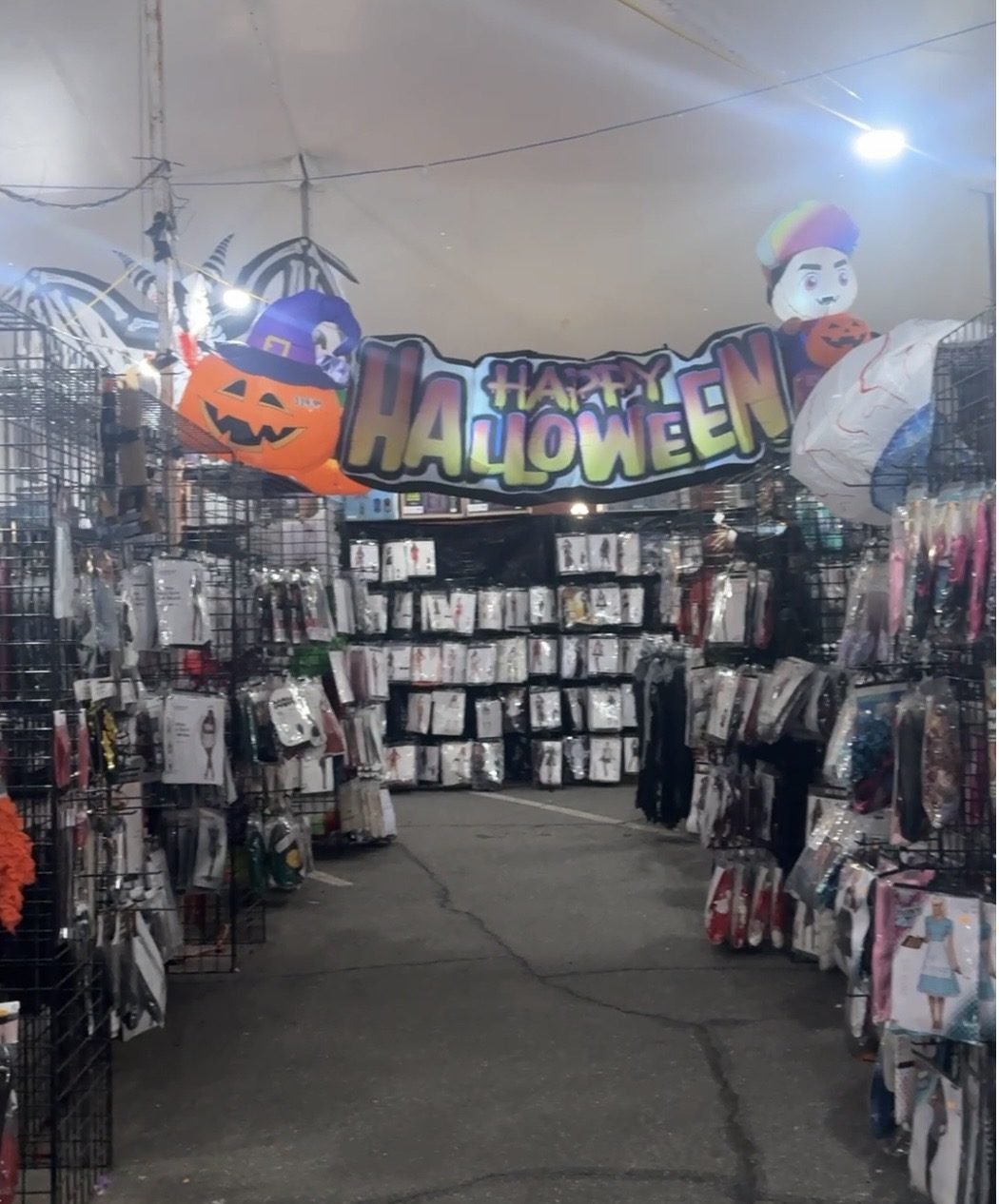 Costume aisles inside the Halloween Express tent